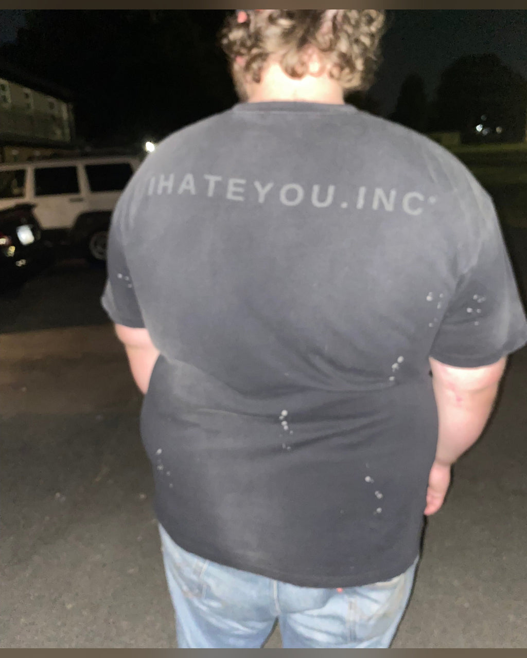 IHATEYOU.inc Hand-Splattered Sunfaded Cotton Tee — front on-model